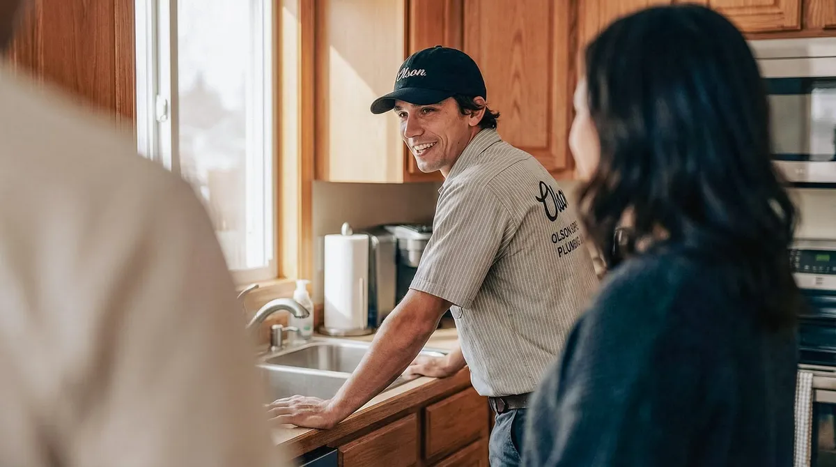 Olson Superior technician greeting a homeowner