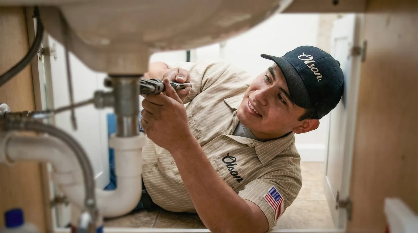 Olson Superior service van arriving at a home for a plumbing appointment